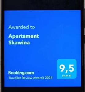 斯卡维纳Apartament Skawina的手机屏幕,上面标有升级到公寓的标志