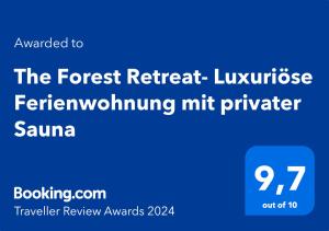 韦默尔斯基兴The Forest Retreat- Luxuriöse Ferienwohnung mit privater Sauna的蓝标读取森林退避丛林冰箱多功能的密特播放器