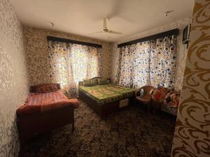 Hotel Kashmir Heaven客房内的一张或多张床位