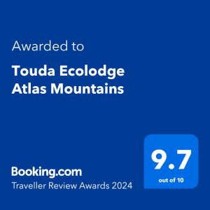Zawyat OulmziTouda Ecolodge Atlas Mountains的给托利亚生态学家地图册的手机的屏幕
