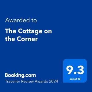 海姆维尔The Cottage on the Corner的电话的屏幕,上面有给角落咖啡的文本