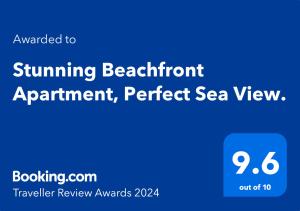 沃辛Stunning Beachfront Apartment, Perfect Sea View.的阳光明媚的浴室的屏风,可预约完美的海景