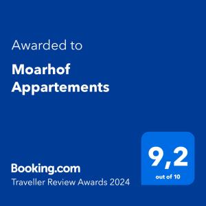 涅德劳Moarhof Appartements的一个蓝色文本框,单词升级到一个月的应用程序