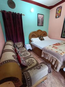 gaurav home stay客房内的一张或多张床位