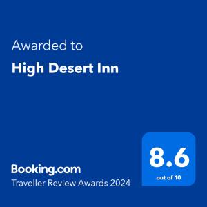 萨利纳High Desert Inn的一部手机的屏幕,上面写着给沙漠宾馆的文字