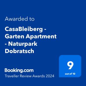 巴特布莱贝格CasaBleiberg - Garten Apartment - Naturpark Dobratsch的给盒式花园公寓的手机的带文本的屏幕