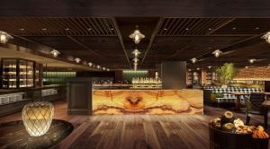 新加坡Grand Hyatt Singapore的餐厅设有酒吧,配有大型大理石台面