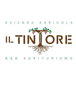 特拉蒙蒂Agriturismo Il Tintore的带有更长标志的树