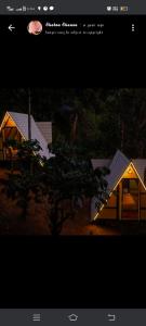 科代卡纳尔Papathi farm house的一张带有帐篷图片的网站页面