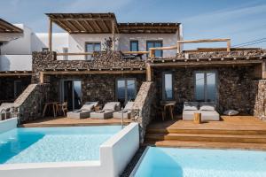 萨鲁Alissachni Mykonos的一座带游泳池和房子的别墅