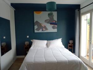 Chalet de 3 chambres avec terrasse et wifi a Marck a 1 km de la plage客房内的一张或多张床位