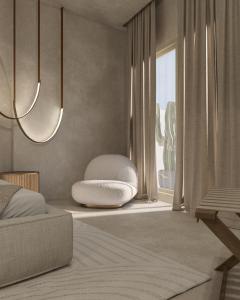 易莫洛林安德罗尼斯概念健康度假村的一间卧室设有一张床和一个大窗户