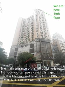 杭州杭州Yootel油条精品青年社交旅舍的前面有标志的高楼