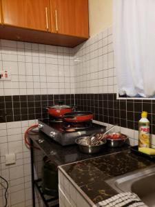 Cozy apartment-Java Blue Embu的厨房或小厨房
