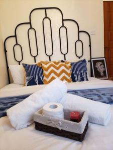 Cozy apartment-Java Blue Embu客房内的一张或多张床位