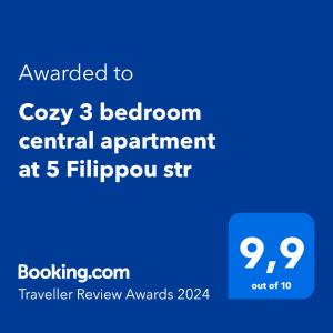 塞萨洛尼基Cozy three BDRMS central APT at five Filippou str的手机的屏幕,文字升级到舒适的卧室中央公寓