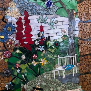 圣地亚哥洛斯卡巴萨纳萨尔瓦多亚尔丁赛克勒托旅舍的花园的画,花园中长着长凳和鲜花