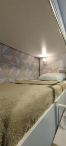 GVR Praia Hostel客房内的一张或多张床位