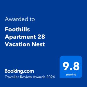 圣费尔南多Foothills Apartment 28 Vacation Nest的蓝文本框,上面的文本被授予足迹指定度假公寓