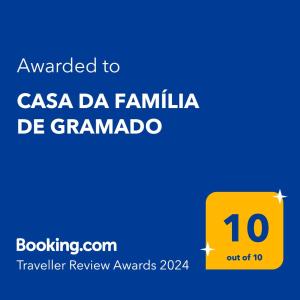 格拉玛多CASA DA FAMÍLIA DE GRAMADO的被授予花岗岩家庭的标志