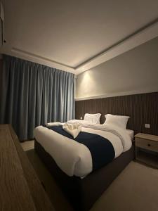 Aladnan hotel客房内的一张或多张床位