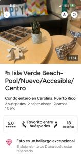 圣胡安Isla Verde frente a la playa y Piscina, Céntrico y Accesible的一张桌子上植物的网站的截图