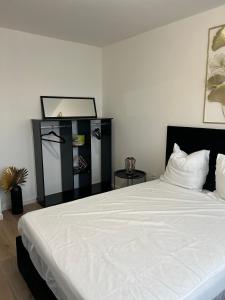 2 bedrooms proche Paris/CDG/Bourget/Parc des expo客房内的一张或多张床位