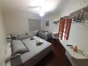 Hotel Vila Solar客房内的一张或多张床位