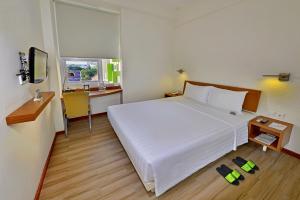 日惹马里奥神童酒店客房内的一张或多张床位