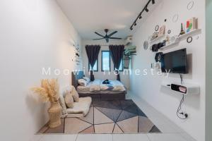 北赖Comfy Studio Room by Moowin的带沙发和电视的客厅