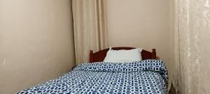 Pavleena Residence 2 Bedrooms unit客房内的一张或多张床位