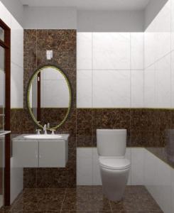 归仁GERBERA HOTEL的一间带卫生间、水槽和镜子的浴室