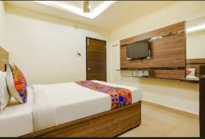 Hotel Raj vihar residency客房内的一张或多张床位