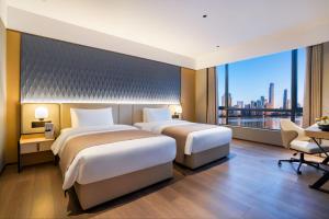 广州广州兰欧国际酒店的景观客房 - 带两张床