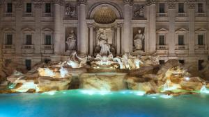 罗马梵蒂冈B＆B酒店的大楼前的大型喷泉