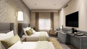 罗萨里托Bellafer Collection Hotel & Resort的配有一张床和一台平面电视的酒店客房