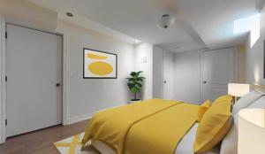 布兰普顿Scotchmere Serenity: Modern 1-Bedroom Brampton Haven的一间卧室配有一张黄色毯子床