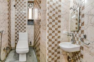 加尔各答FabExpress Scholer Motel的一间带卫生间和水槽的浴室