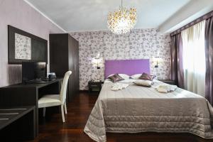 Hotel Mastrodattia客房内的一张或多张床位