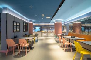 Hanting Hotel Shenzhen Coastal City餐厅或其他用餐的地方