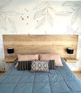Patagonia Suites - Departamentos客房内的一张或多张床位