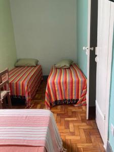 Pousada Barão de Santa Helena客房内的一张或多张床位