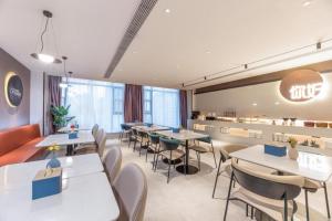 Nihao Hotel Wuxi Shuofang Airport餐厅或其他用餐的地方