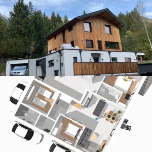 因斯布鲁克Waldblick - modern wohnen - Self-Check-In - direkt am Wald - kein Verkehr - in 10 Minuten im Innsbrucker Zentrum - vorm Haus parken的屋顶房屋的 ⁇ 染