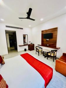 Amora Rooms Dwarka客房内的一张或多张床位