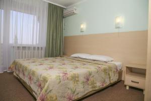 第聂伯罗彼得罗夫斯克酒店客房内的一张或多张床位