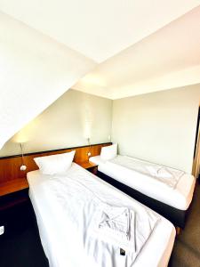 布林克曼多夫酒店客房内的一张或多张床位