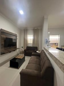 Apartamento Completo - Algarve 203 e 204的休息区