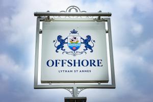 莱瑟姆-圣安妮Offshore - The Inn Collection Group的利特瓦尼亚人地名办公室入口的标志