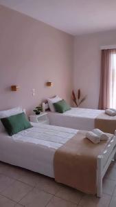 拉加纳斯Lunzi Verde的配有两张大床的客房